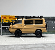 Load image into Gallery viewer, Autobots 1:64 Yellow 4WD Delica L300 Camper Van Model Diecast Metal Car
